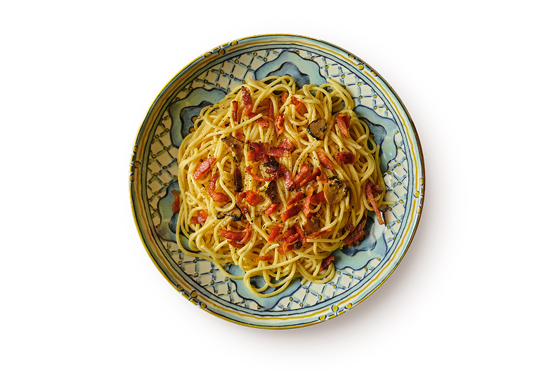 La Famiglia se sienta a la mesa