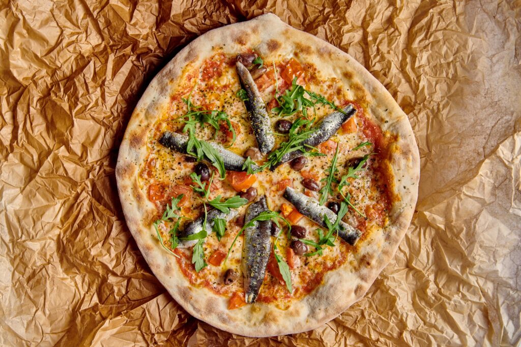 pizza de sardinas marinadas